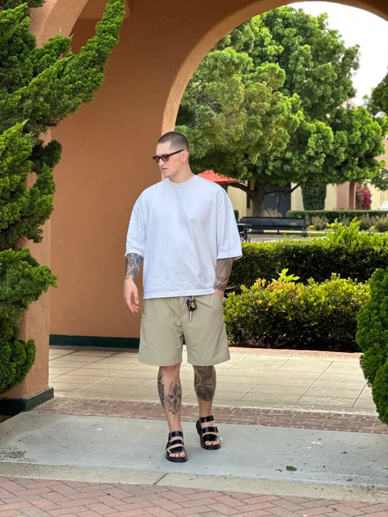 Gleb, fine line tattoo artist in San Diego showing his tattoo work